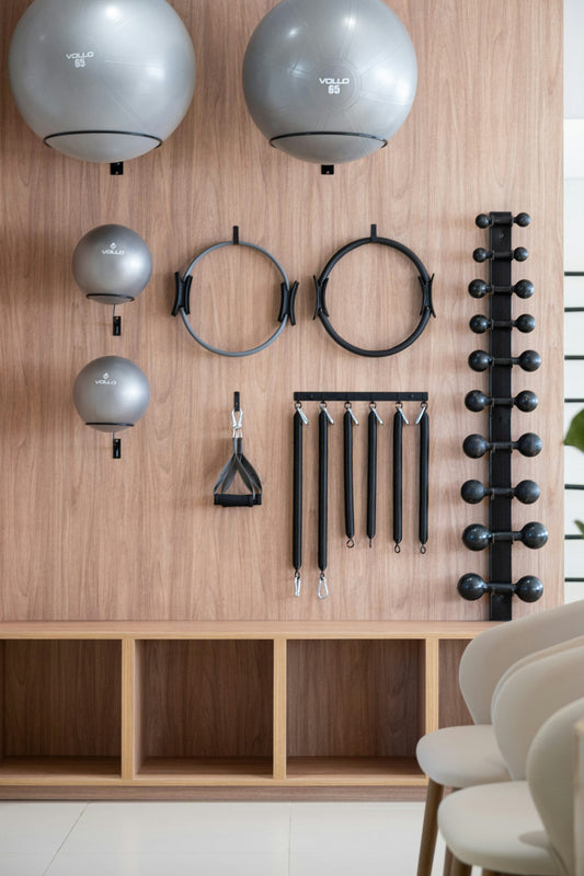 Home gym with equipment neatly organised on a wooden wall