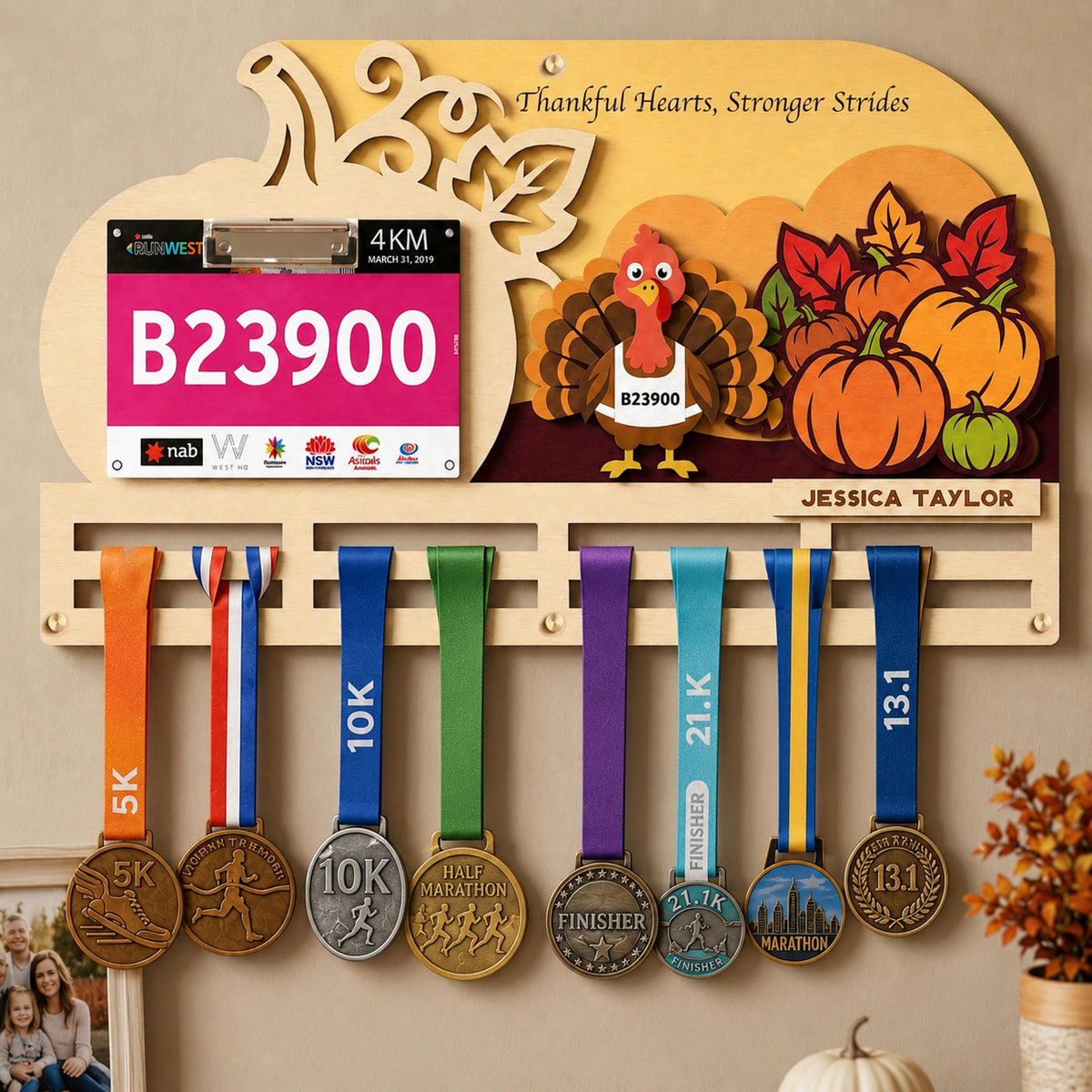 Turkey Trot medal holder – turkey with bib number and pumpkin scene