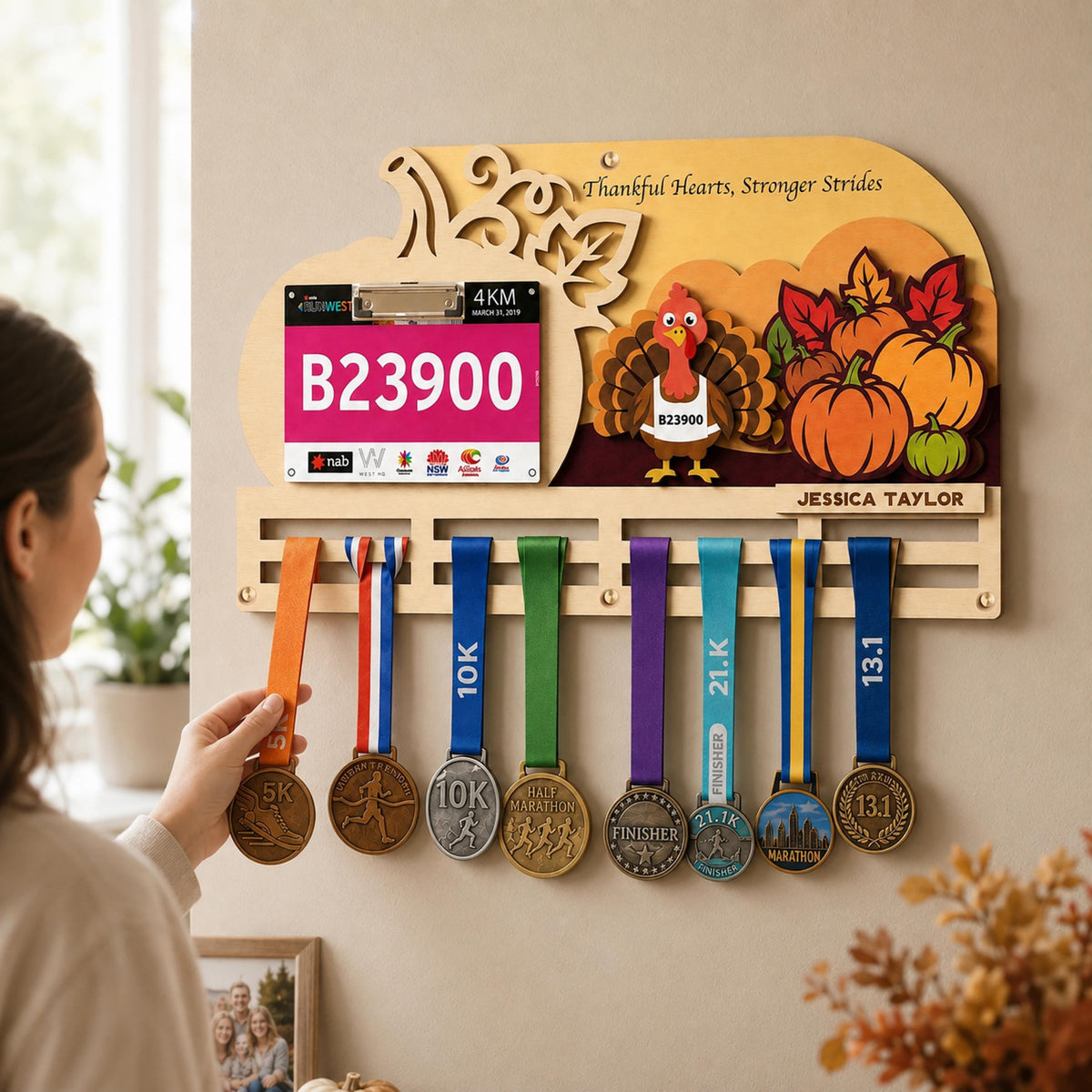 Turkey Trot medal holder – Thanksgiving race bib and medal rack on a wall