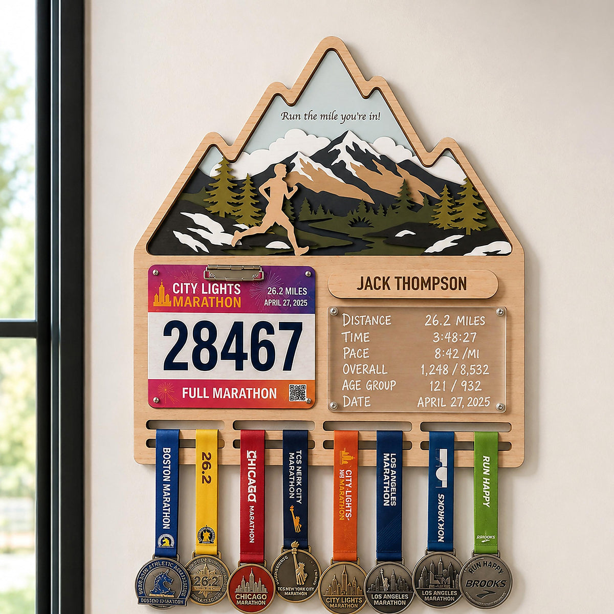 Mountain runner medal holder with race stats board – bib, stats board and medals