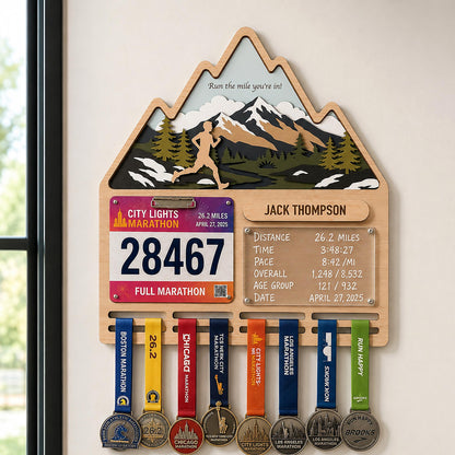 Mountain runner medal holder with race stats board – bib, stats board and medals