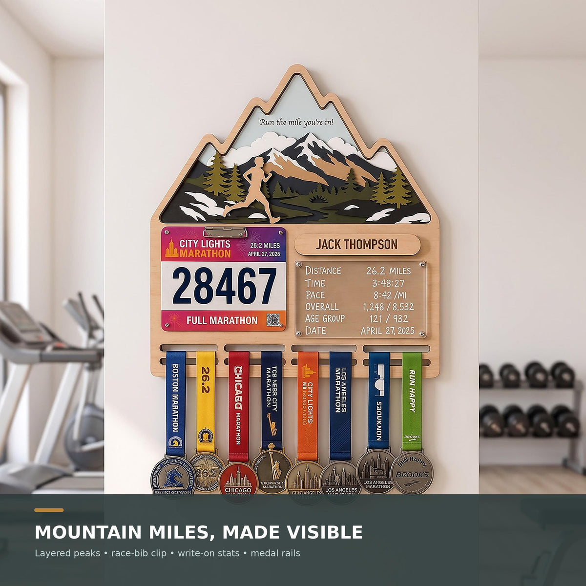 Mountain runner medal holder with race stats board – in a home gym