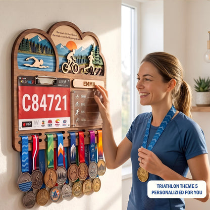 Triathlon medal holder and race bib display – runner writing her split times