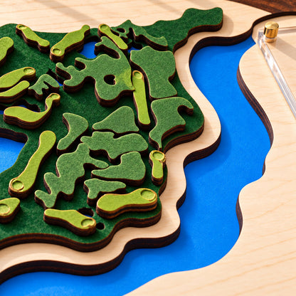Golf simulator room decor course map – layered greens and water close-up