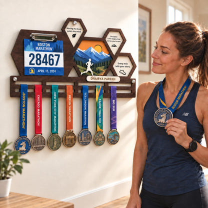 Hexagon race bib and medal holder – runner with her medal display